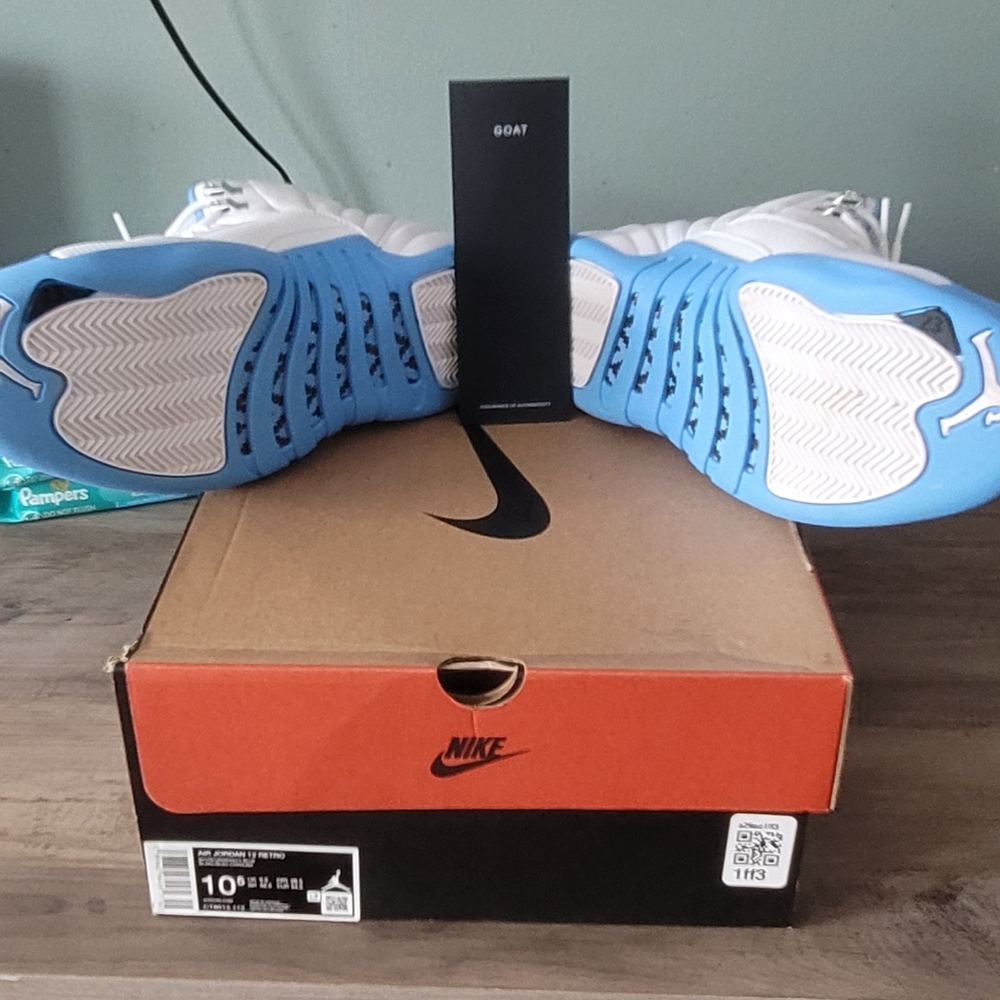 Nike White Sneakers with Light Blue Outsoles